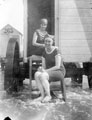 Ida Stringfellow (in doorway) and friend at Scarborough or Cleethorpes, ...